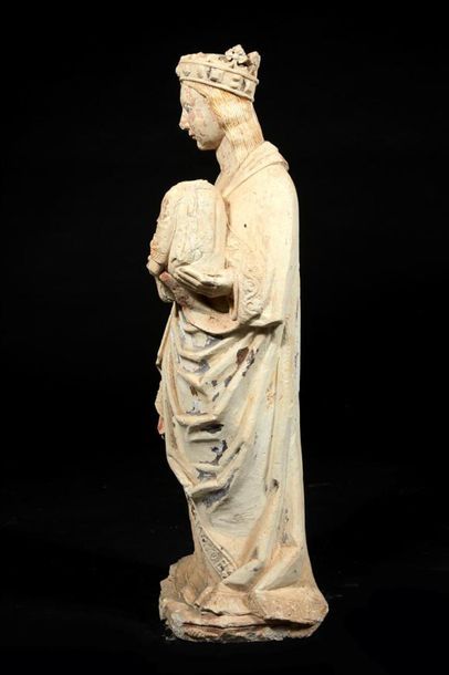 Vierge à l'Enfant en pierre calcaire sculptée...