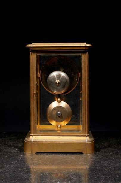Pendule cage en bronze, vitres biseautées,...