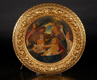 Cadre rond en bois doré sculpté d'une guirlande...