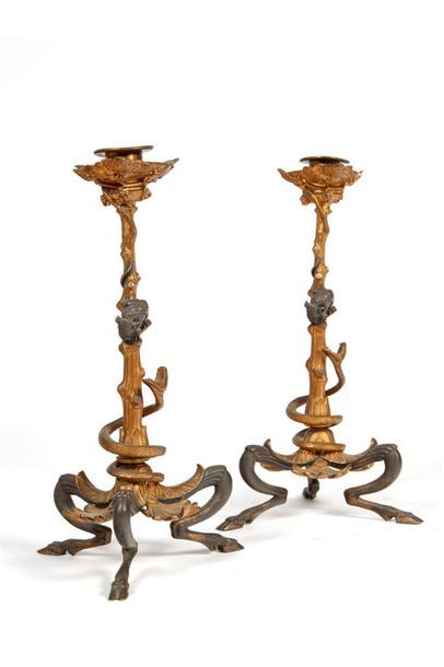 Paire de candélabres en bronze patiné brun,...