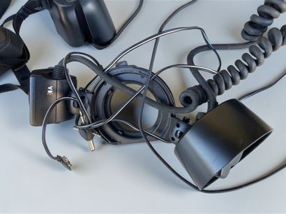 A collection of assorted photography equipment,...