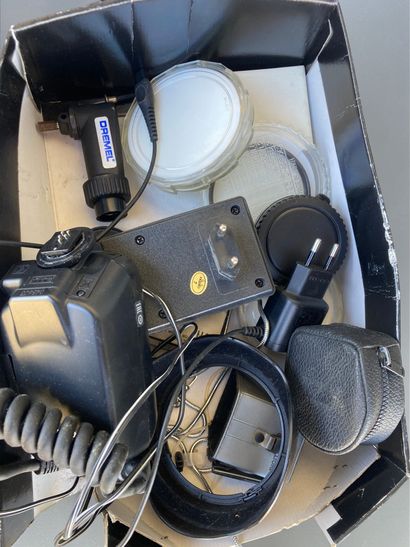 A collection of assorted photography equipment,...