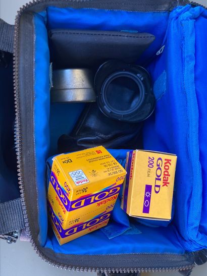 A collection of assorted photography equipment,...