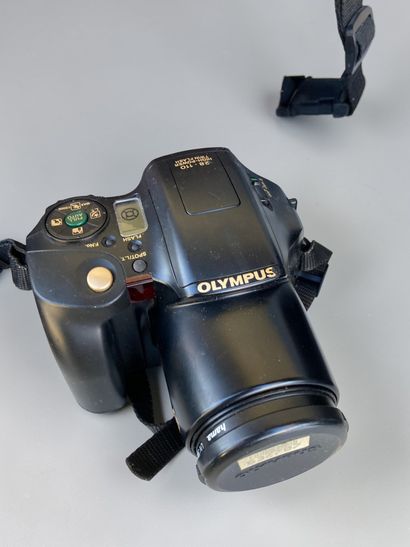 A collection of assorted photography equipment,...