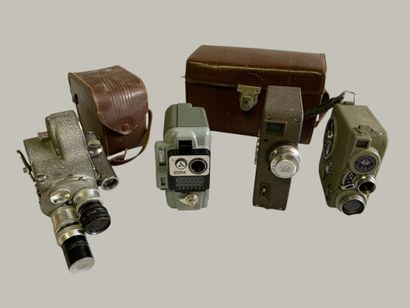 Set of four assorted cameras. In a case:...