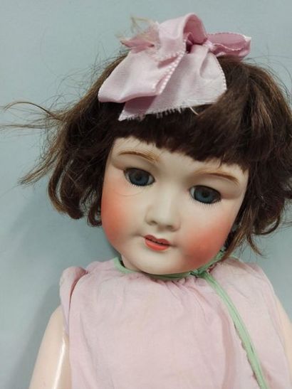 Twin Doll 

Wooden body and porcelain head

Accidents...