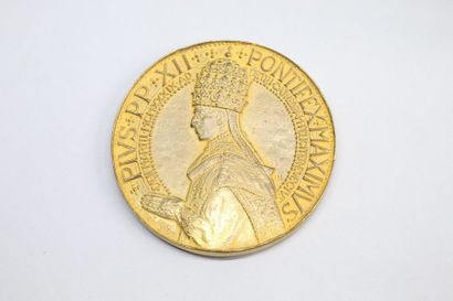 Importante médaille en bronze doré d'ap....