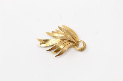 Broche en or jaune 18k (750) figurant une...