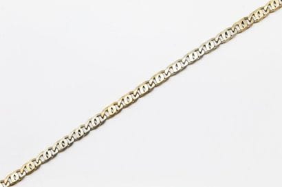 Bracelet en or jaune 14k (585).

Tour de...