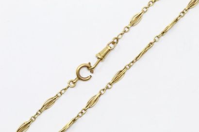 Débris d'or jaune 18k (750) : chaîne giletière.

Poids...