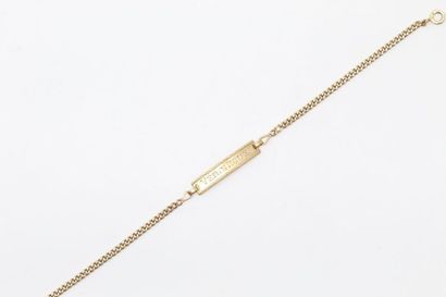 Gourmette en or jaune 18k (750) gravée Véronique...