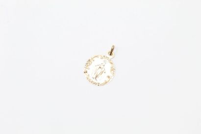 Médaille en or jaune 18k (750) figurant un...