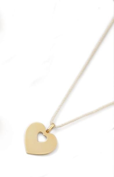 Coeur pendentif en or jaune ajouré. POIRAY...