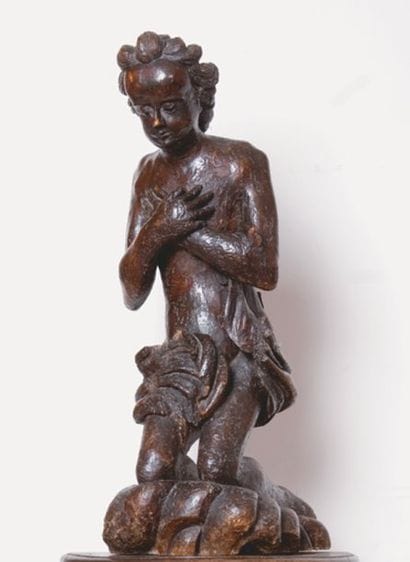 Ange à genoux en bois sculpté anciennement...
