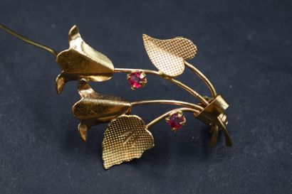 Broche en or jaune 18k (750) formant deux...