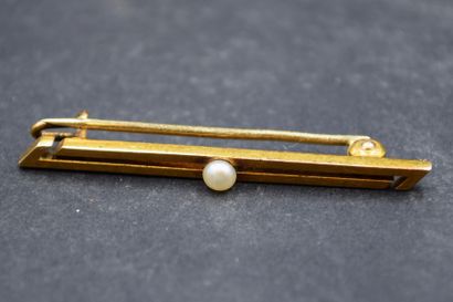 Broche barette en or jaune 14k (585) retenant...