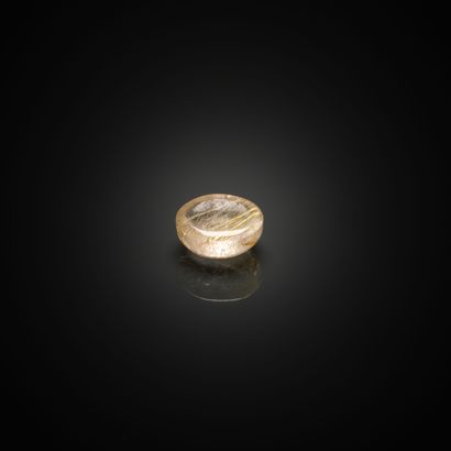 Quartz rutilé rond cabochon dit 