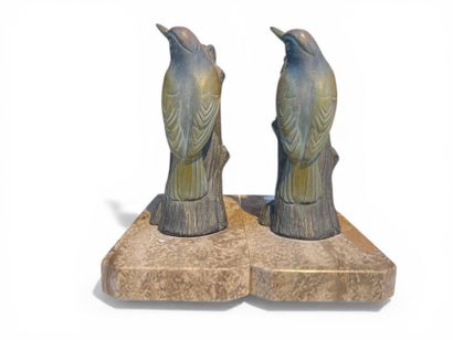 Paire de serre-livres figurant des oiseaux...