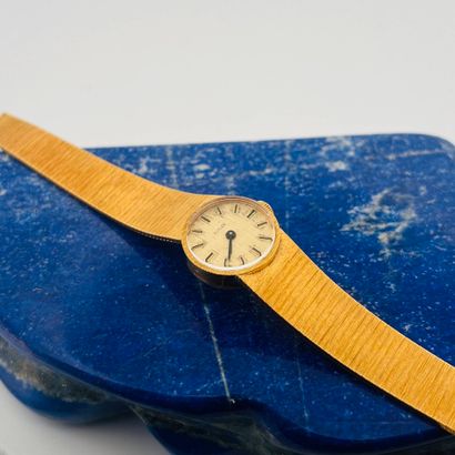 GUILDE 
Montre bracelet de dame en or jaune...