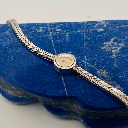 FLAMOR
Montre bracelet de dame en or gris...