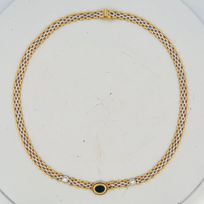 Collier en or 18K (750) et argent (800) à...
