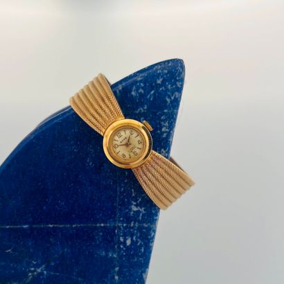 RENO
Montre bracelet de dame en or jaune...