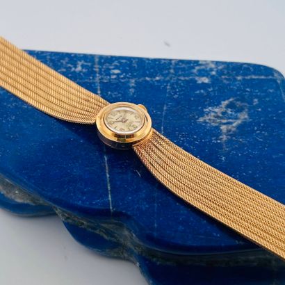 RENO
Montre bracelet de dame en or jaune...