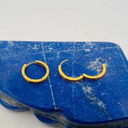 Paire de créoles en or 18K (750) à décor...