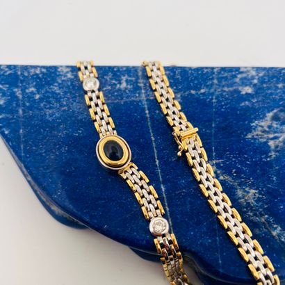 Collier en or 18K (750) et argent (800) à...