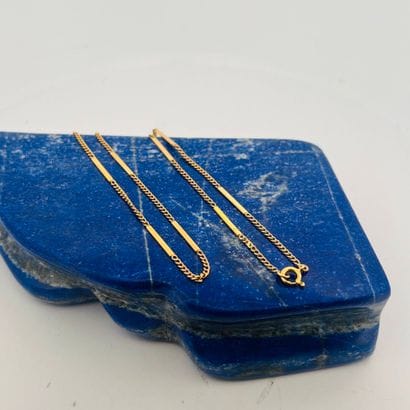 Chaine en or 18K (750) à maille gourmette...