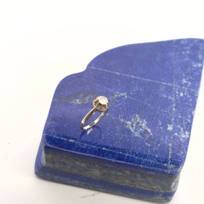 Solitaire en or gris 18K (750) sertie d'un...