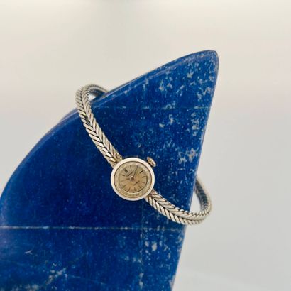 FLAMOR
Montre bracelet de dame en or gris...