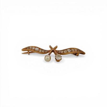 Broche en or rose 14k (585e), stylisant des...