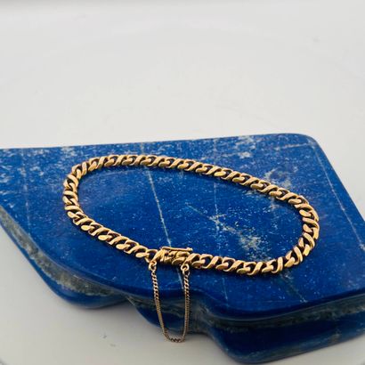 Bracelet en or jaune 14K (585) à maille gourmette...