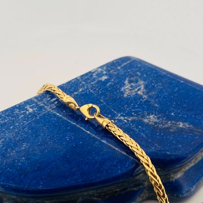 Collier en or jaune 18K (750) à maille palmier...