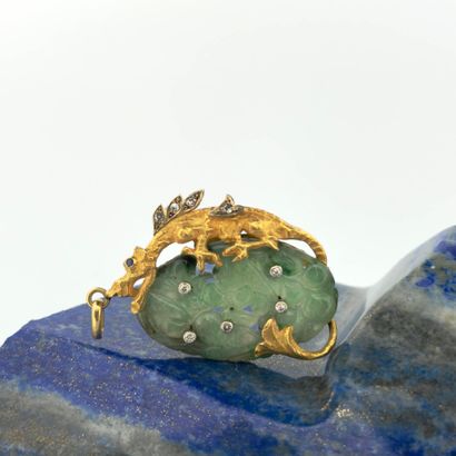 Pendentif en or jaune 18K (750) stylisant...