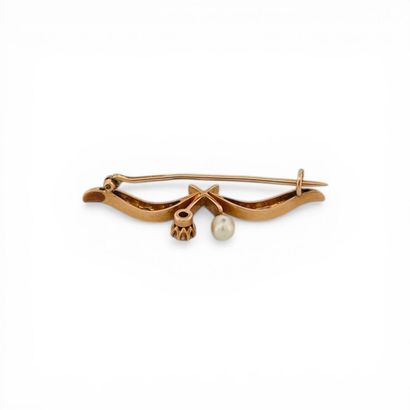 Broche en or rose 14k (585e), stylisant des...