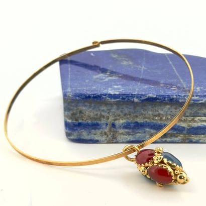 Pendentif en or 18K (750) serti de calcédoines,...