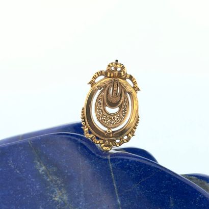 Element de collier en or 18K (750) de forme...