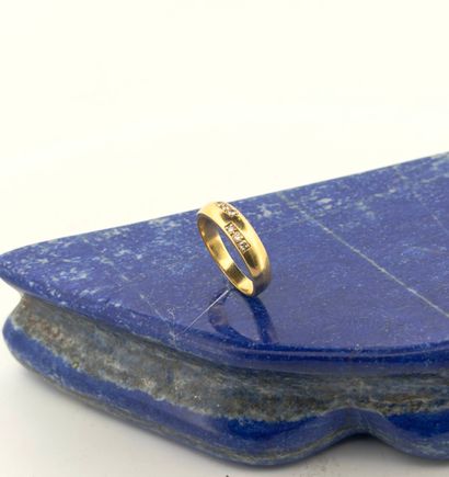 Bague bandeau en or jaune 18K (750) sertie...