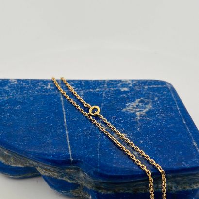 Chaîne en or jaune 18K (750) à maille forçat....