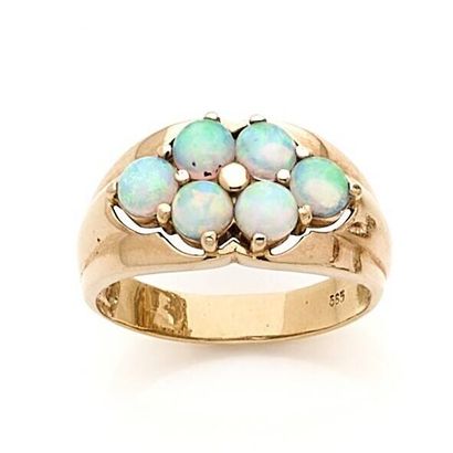 Bague en or 14k (585e), ornée de 6 cabochons...