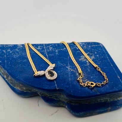 Collier en or 18K (750) formé d'une chaine...