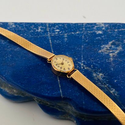 Montre bracelet de dame en or jaune (750)...