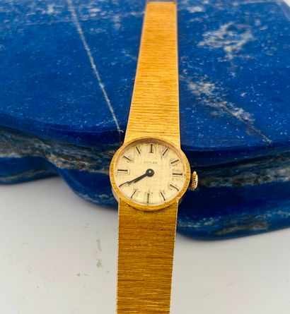 GUILDE 
Montre bracelet de dame en or jaune...