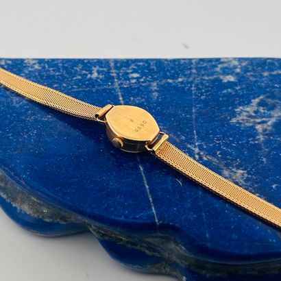 Montre bracelet de dame en or jaune (750)...