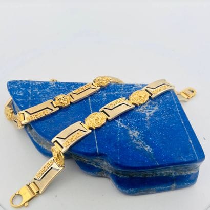 VERSACE
Demi-parure en or jaune (750) comprenant...