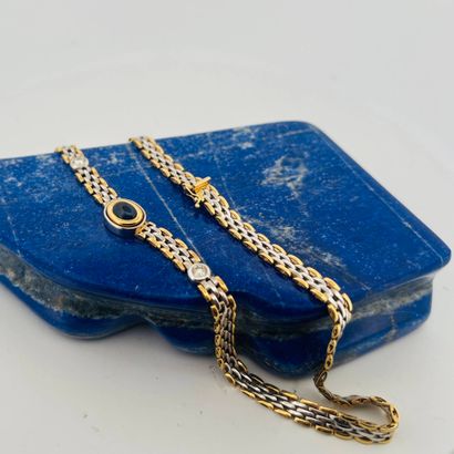 Collier en or 18K (750) et argent (800) à...