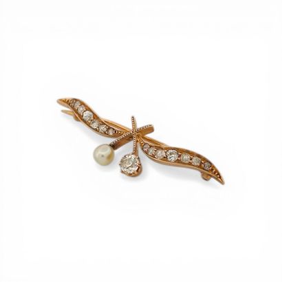 Broche en or rose 14k (585e), stylisant des...