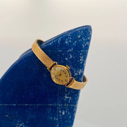 Montre bracelet de dame en or jaune (750)...